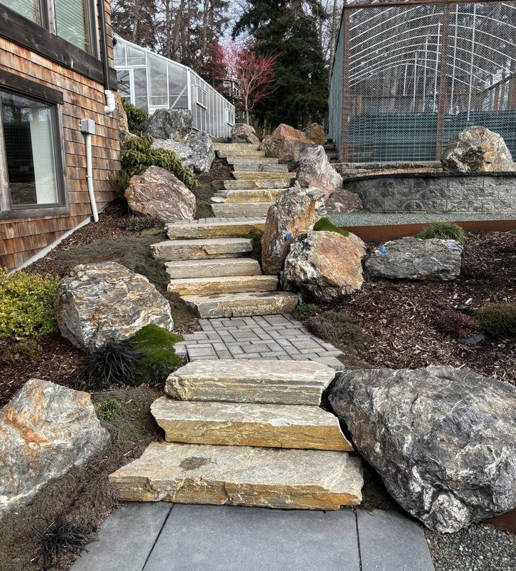 Finished stone staircase and boulder garden on Whidbey Island