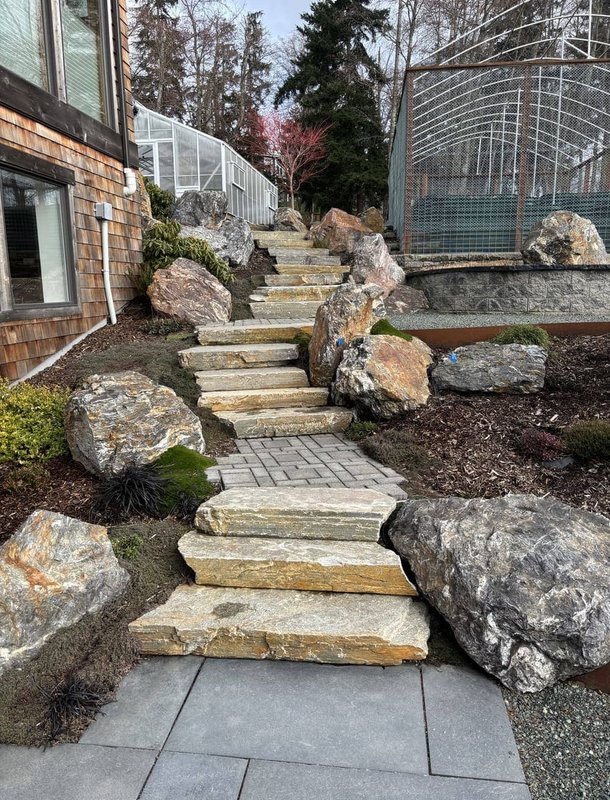 Finished stone staircase and boulder garden on Whidbey Island